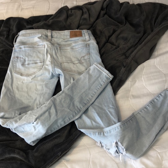 Light Wash Distressed Jeans - Picture 3 of 4
